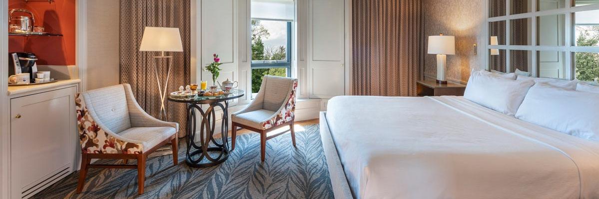 a room with a bed and a chair